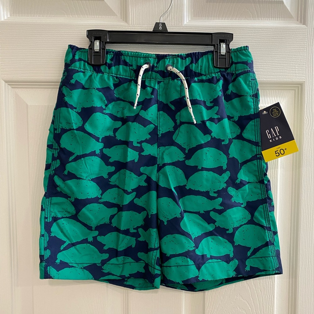 NWTs GapKids Boys size Large (10) lined swim trunks. Navy with green turtles